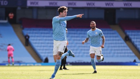 STONE COLD: The defender celebrates his accurate goal.