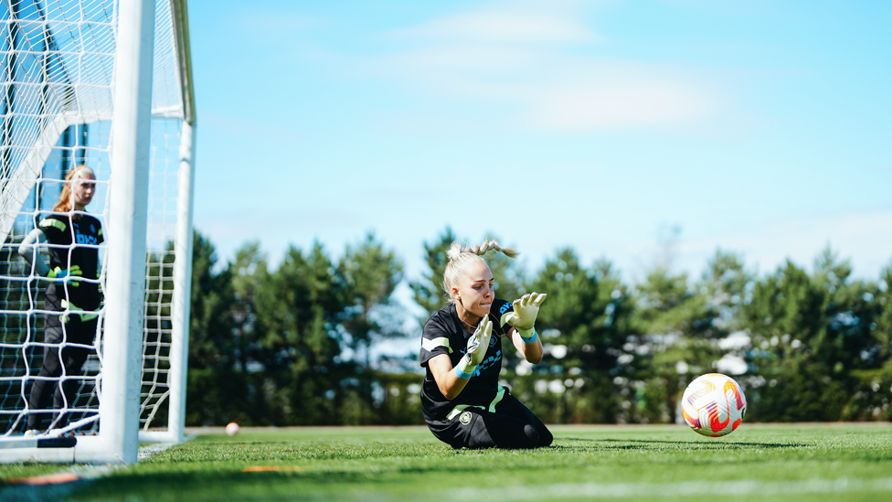 SAFE HANDS : Ellie Roebuck gets down to make the save