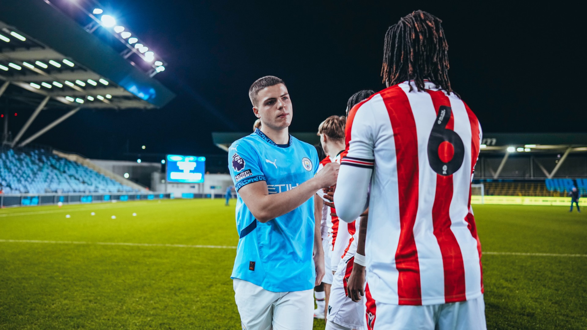 LEADING MAN: Captain Will Dickson exchanges pre-match handshakes