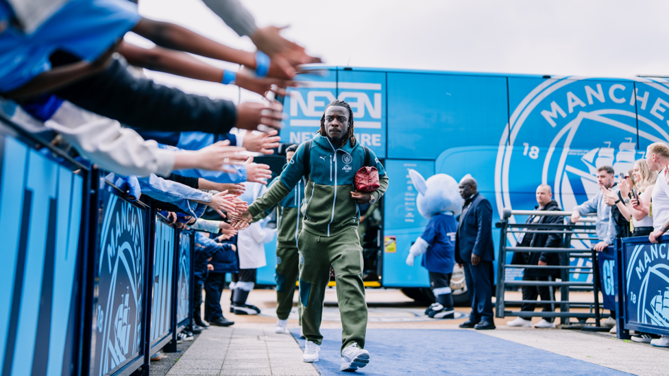 DAZZLING DOKU : Our in-form winger arrives at the Etihad.