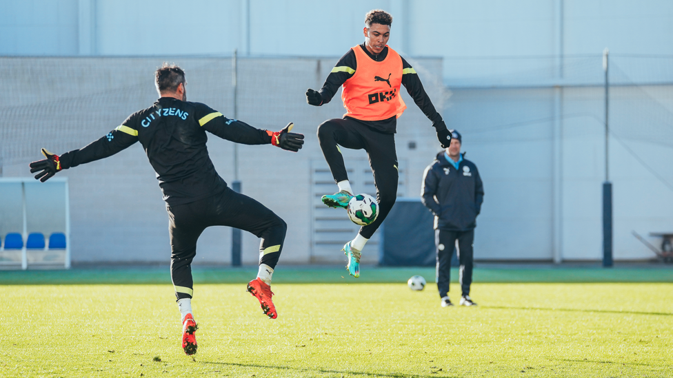 UP HIGH : Morgan Rogers and Scott Carson compete for the ball