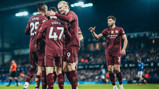 GROUP HUG: Foden feels the love!