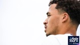 Profile view of a man looking into distance with Asia Tour '26 logo in the corner.