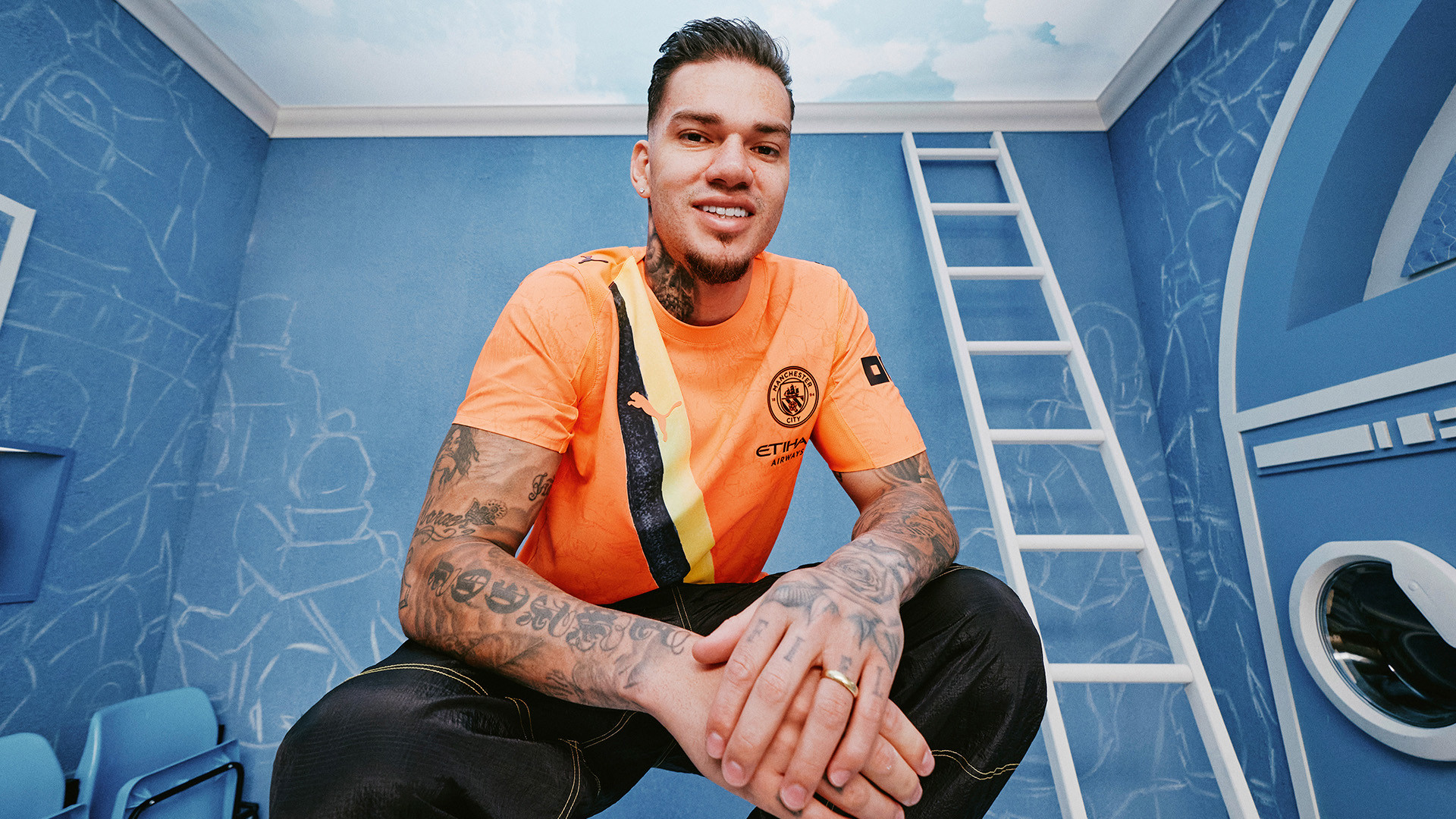KIDSUPER GOALKEEPER TOP : Ederson in the orange shirt