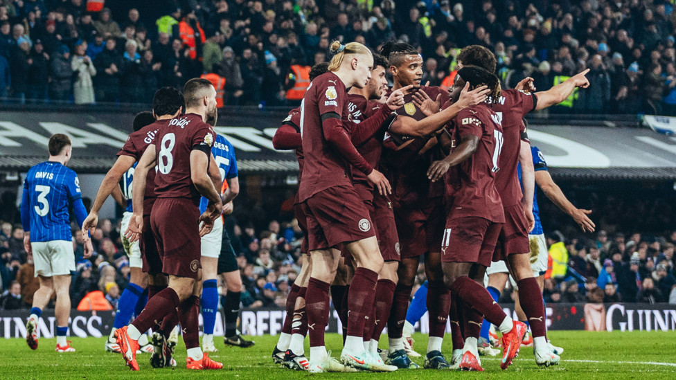 GROUP HUG : Kovacic feels the love.