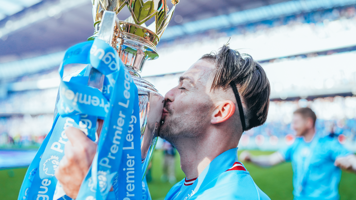 ONE KISS: Grealish loving it!
