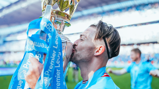 ONE KISS: Grealish loving it!