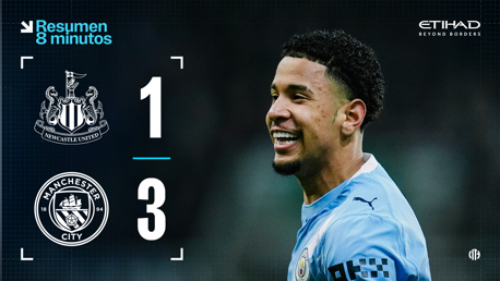Scoreboard showing Newcastle United 1, Manchester City 3 with a blurred player in Manchester City uniform.
