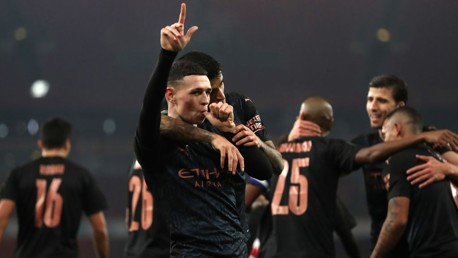 PHENOMENAL PHIL: Our midfielder celebrates with his teammates