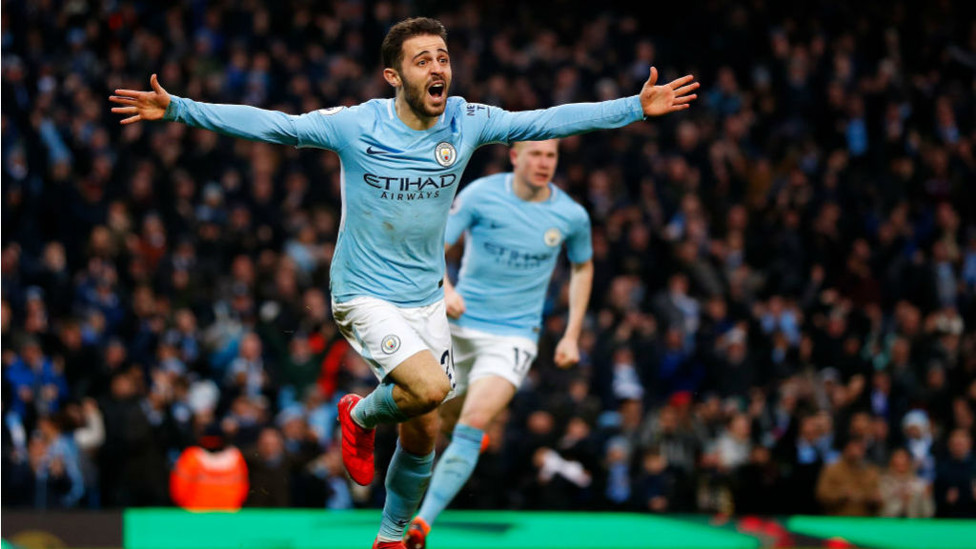 CAPITAL GAINS : The Portuguese marvel wheels away in delight after netting a crucial league winner against Chelsea in March 2018