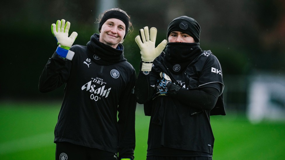 Wave for the camera! And Katie Startup and Eartha Cumings do just that!