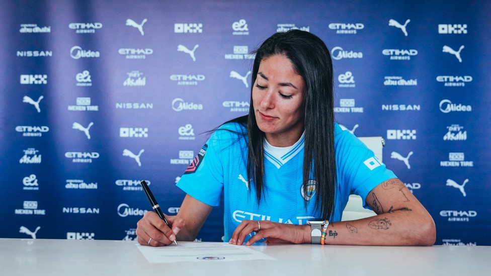 PEN TO PAPER  : Ouahabi pens her City contract extension.