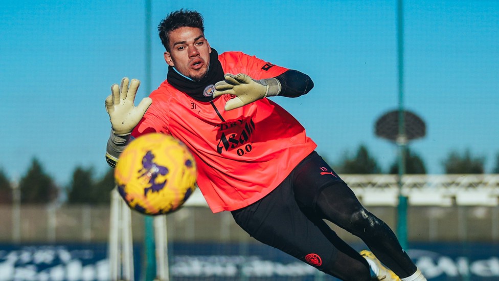 BRILLIANT BRAZILIAN : Ederson dives for the ball