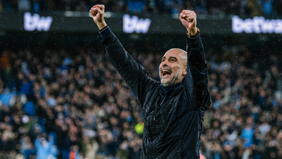 HAPPY PEP : The boss celebrates on the touchline.