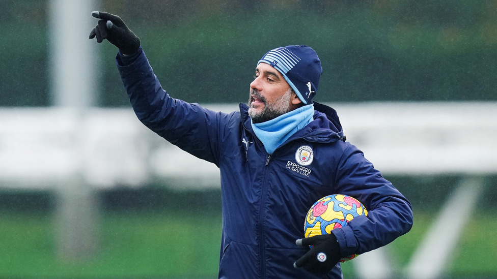 THE BOSS : Pep Guardiola dishes out some instructions
