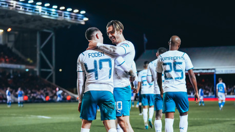 CREATOR & SCORER: Grealish shows his appreciation to Foden after his spectacular assist.