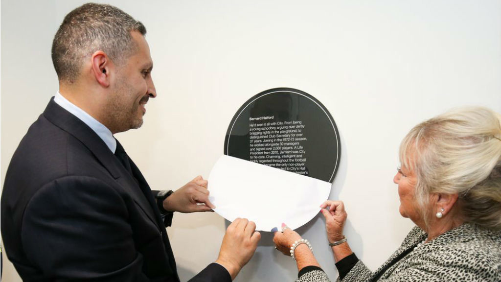 INFLUENCE WRIT LARGE : The chairman and Karen Halford unveil an inscription detailing Bernard's incredible impact on Manchester City