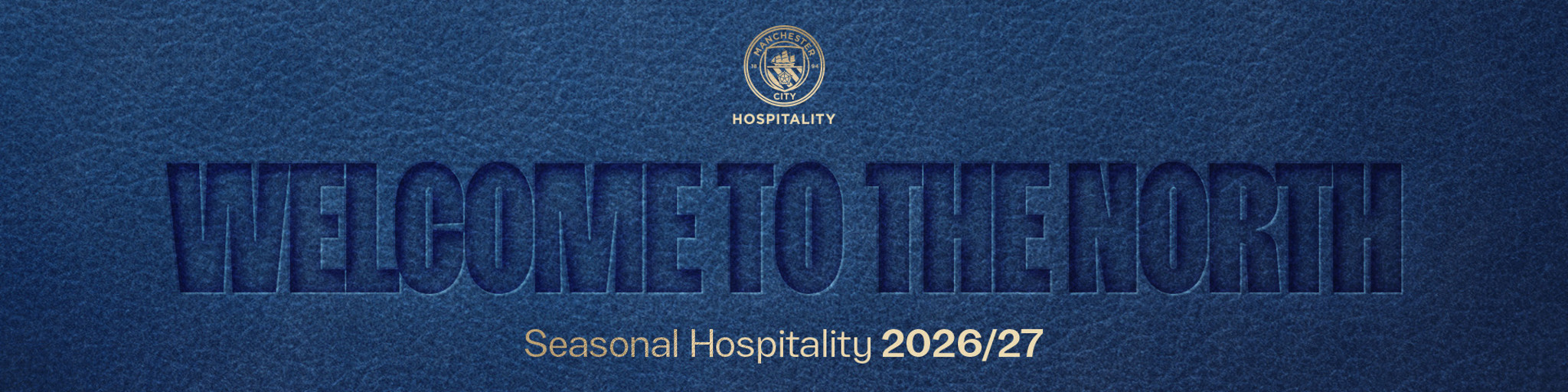 Blue textured background with the words 'WELCOME TO THE NORTH' and 'Seasonal Hospitality 2026/27' along with a Manchester City logo and 'HOSPITALITY' text.