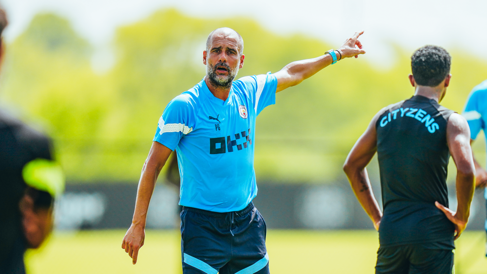BOSSING IT : Pep Guardiola watches on