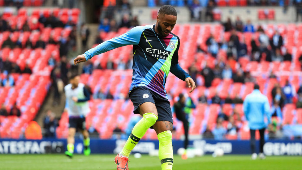 STERLING SILVER : Raheem sports the mash up of shirts which have seen us win six major trophies and counting.