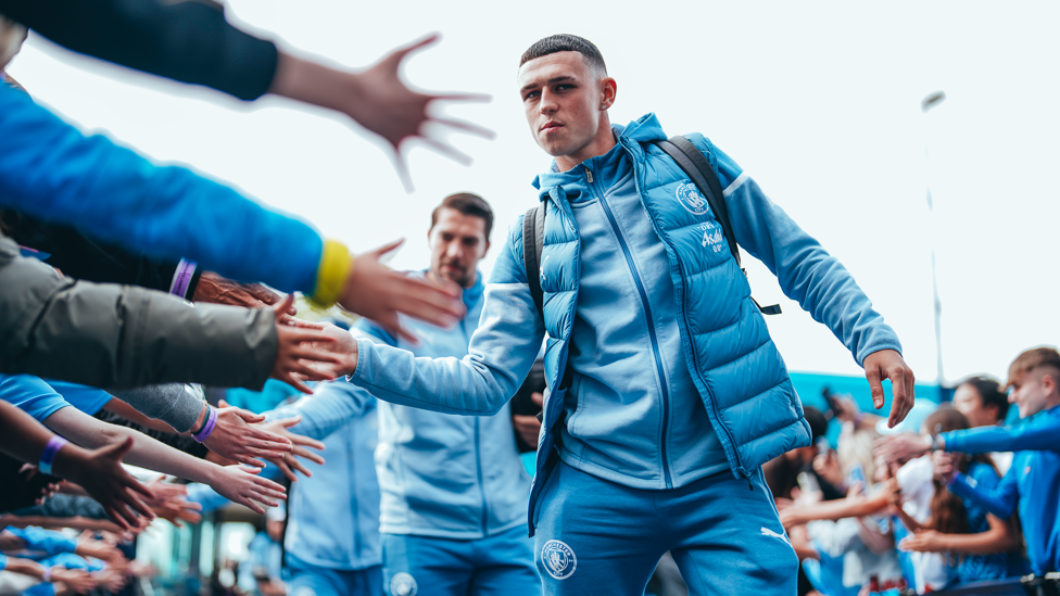 HIGH FIVES : Foden feels the love from the fans.