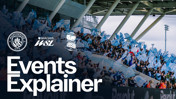 Crowd with flags at a Manchester City vs Birmingham City WSL match. Includes logos for Manchester City and Birmingham City football clubs.