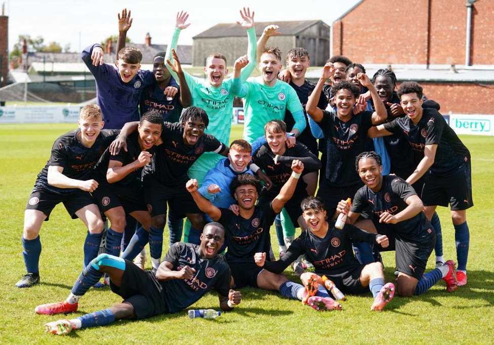 CROWN JEWELS: The victorious City squad are all smiles after sealing the regional league title