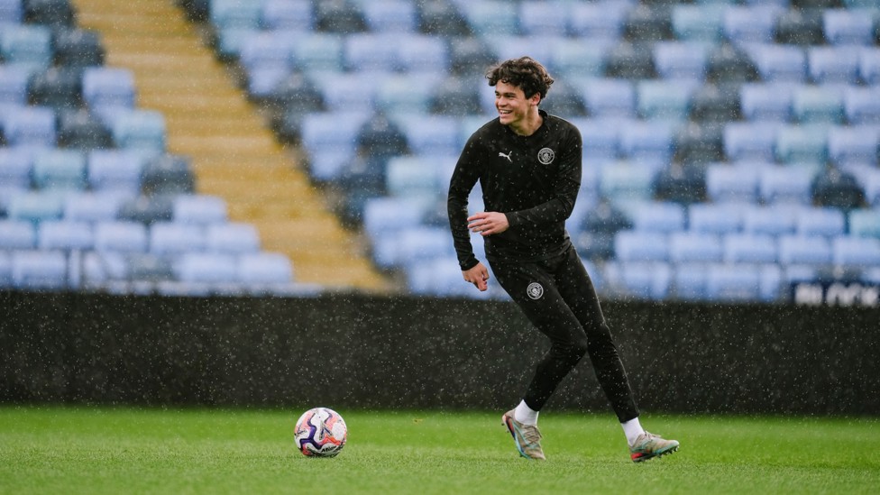 TYPICAL MANCHESTER WEATHER : Teddie Lamb isn't letting the rain ruin his vibe.