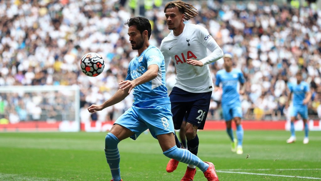 ACTION STATIONS: Ilkay Gundogan takes the fight to Spurs