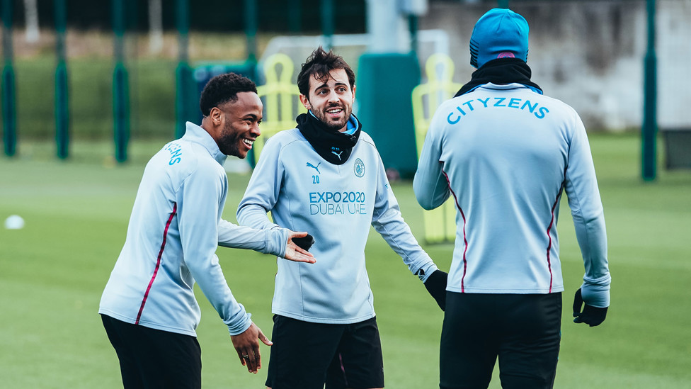 DYNAMIC DUO : Saturday's goalscorers Raheem Sterling and Bernardo Silva have some fun with Jack Grealish
