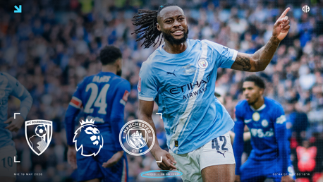 A Manchester City player in a light blue jersey is celebrating during a match against AFC Bournemouth in the Premier League on May 19, 2026.