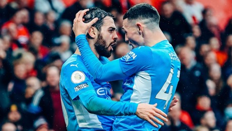 MAESTROS: Foden and Bernardo celebrate the second goal.
