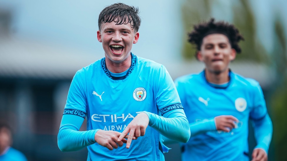 A STAR : Kian Noble's goal celebration after his strike in our league win over Liverpool. 