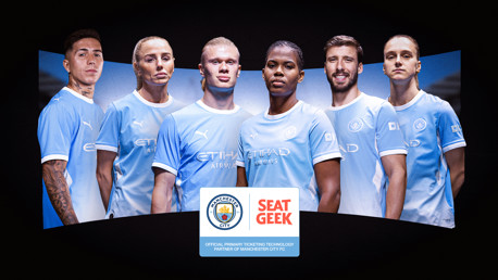 A group of six people wearing Manchester City jerseys, standing in a line. Below is the Manchester City and SeatGeek logos with a partnership note.
