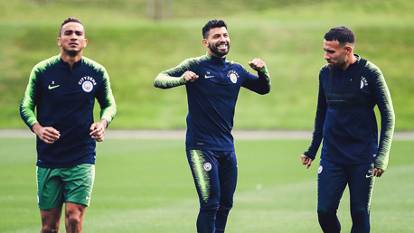 CENTRE OF ATTENTION: Sergio Aguero is all smiles alongside Danilo and Nicolas Otamendi