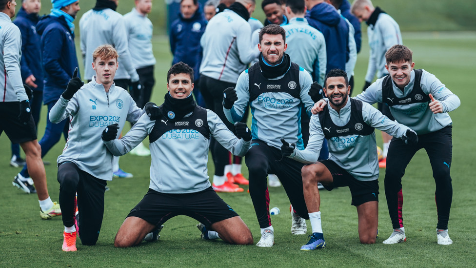 SQUAD GOALS : Cole Palmer, Rodrigo, Aymeric Laporte, Riyad Mahrez and James McAtee strike a pose for the camera.