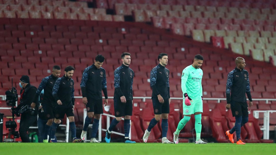 SQUAD GOALS: The team walk out onto the pitch