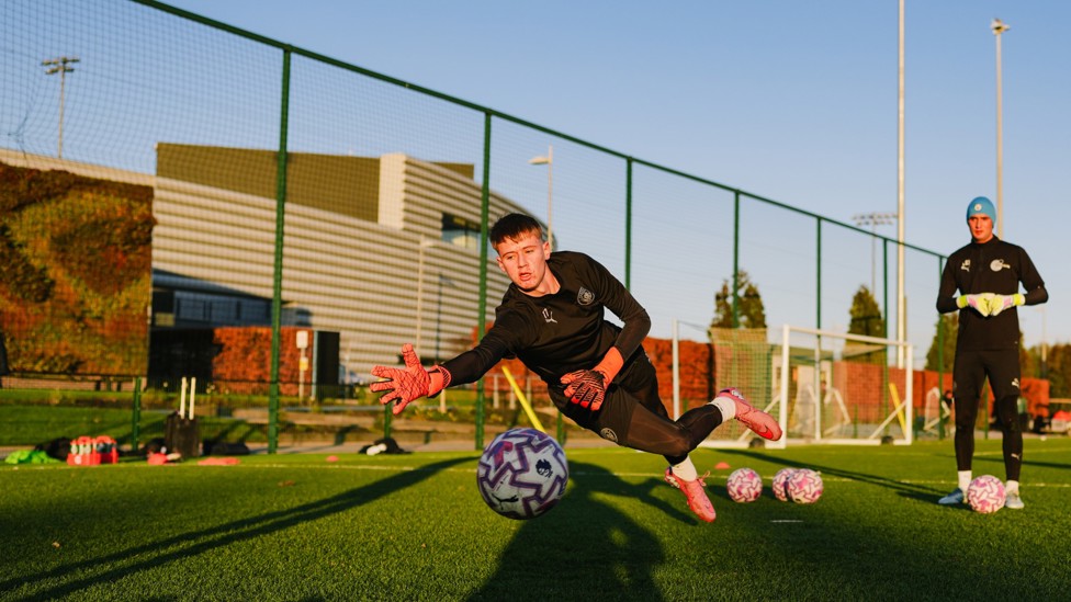 GET LOW : Finley Grigg makes a diving save.
