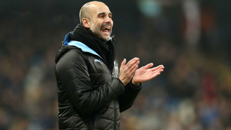 THE BOSS: Guardiola offers encouragement to his players at the Etihad.