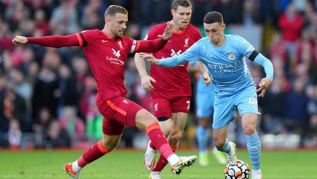 PHIL-ING IT: Foden gets past Henderson.