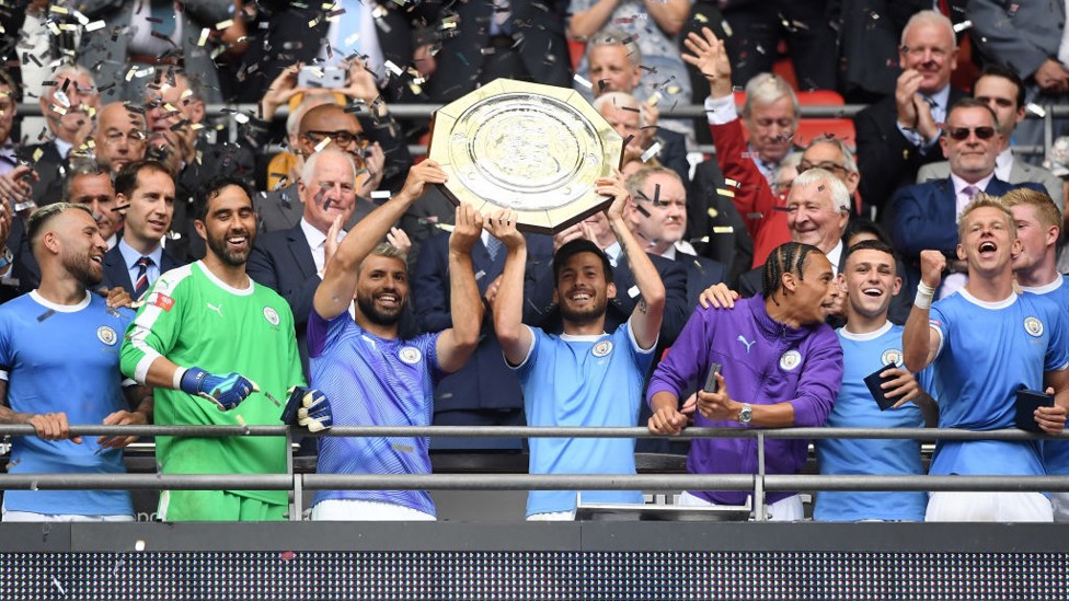 SUPERSTARS : David Silva and Sergio Aguero lift the Community Shield.