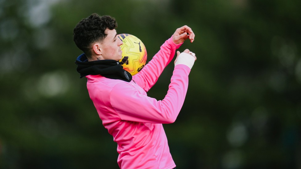 TAKE IT DOWN : Phil Foden controls the ball on his chest