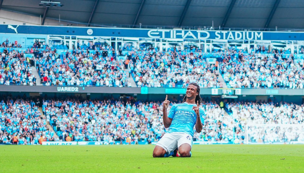 GOALSCORER : Celebrating one of his 10 strikes in a City shirt
