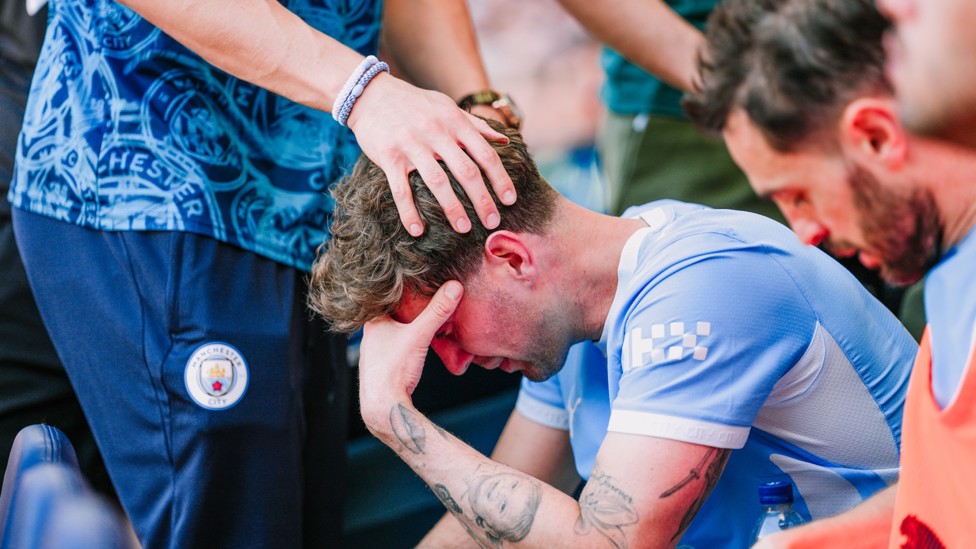 STRONG FEELINGS : John Stones overcome as he bids farewell.