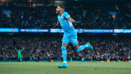 MAHRVELLOUS: Riyad wheels away to celebrate after scoring City's third of the game!