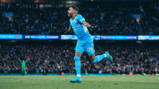 MAHRVELLOUS: Riyad wheels away to celebrate after scoring City's third of the game!