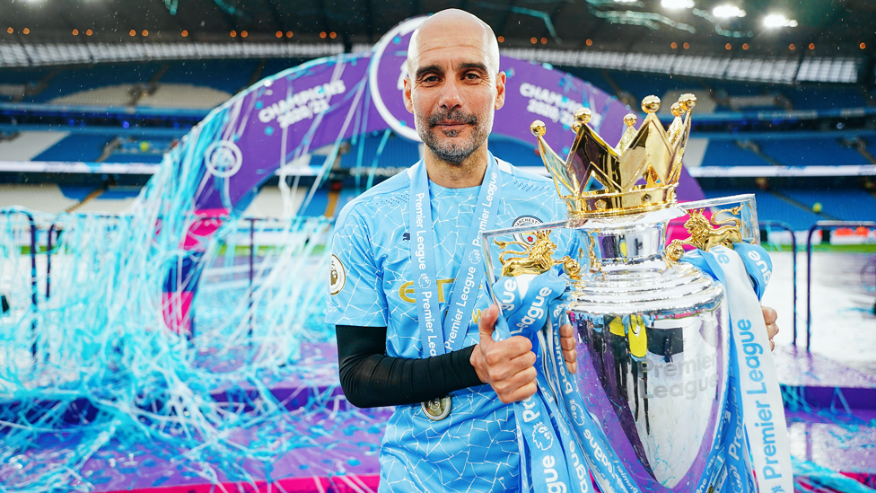 EMOTIONAL : Guardiola after lifting the 2020/21 Premier League, his third title