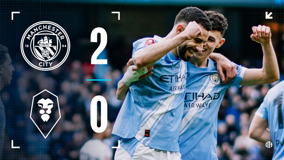 Manchester City won 2-0 against Salford City. The image shows Manchester City players celebrating with the score and team logos visible.