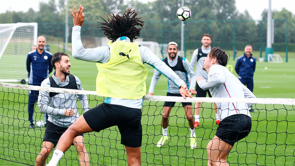 Nathan Ake goes up for a crucial winning point...