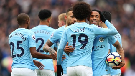 DEADLOCK BROKEN: City celebrate after Leroy Sané scored his tenth goal of the season to take an early lead.